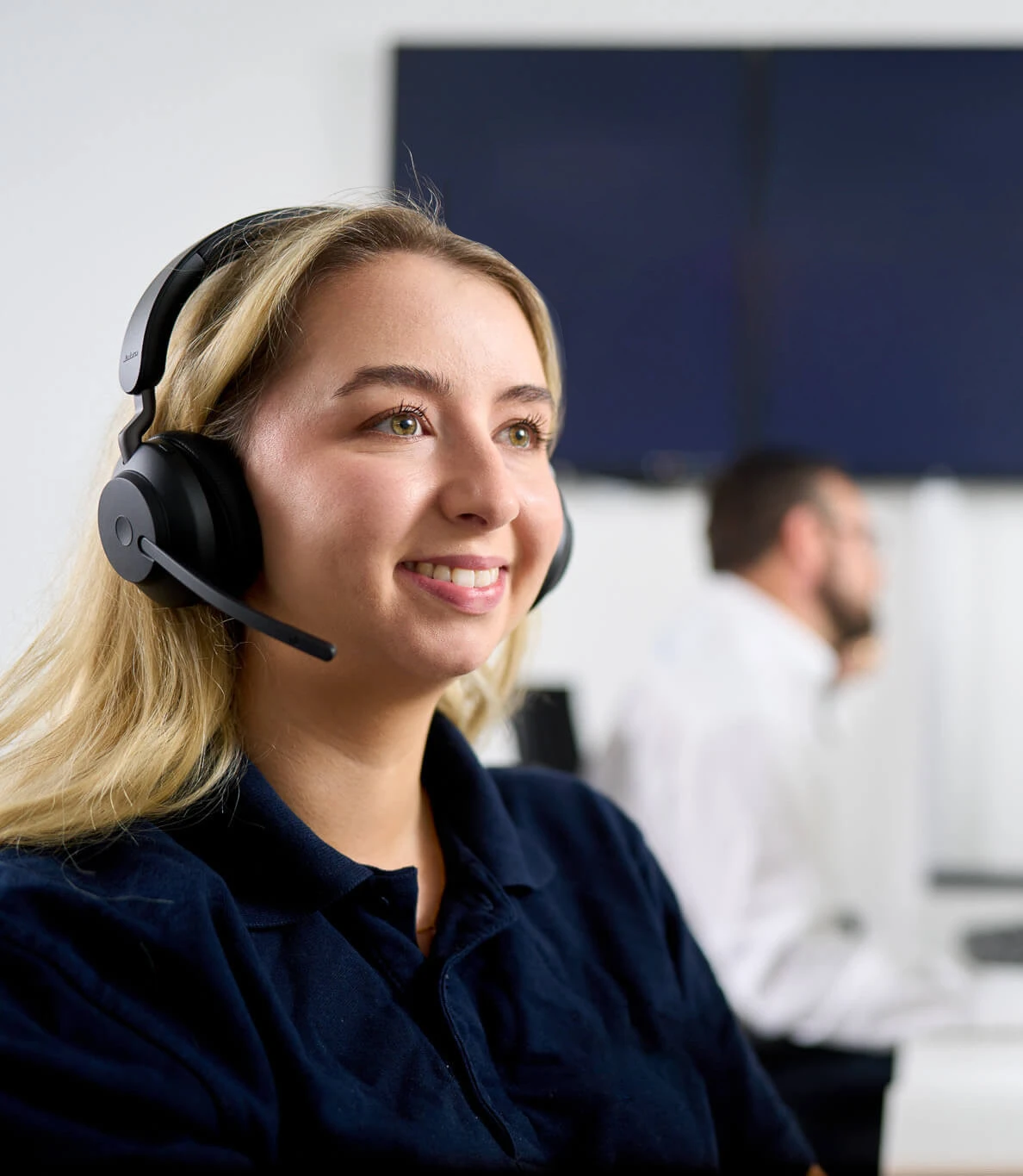 Emily wearing a headset at Techcare