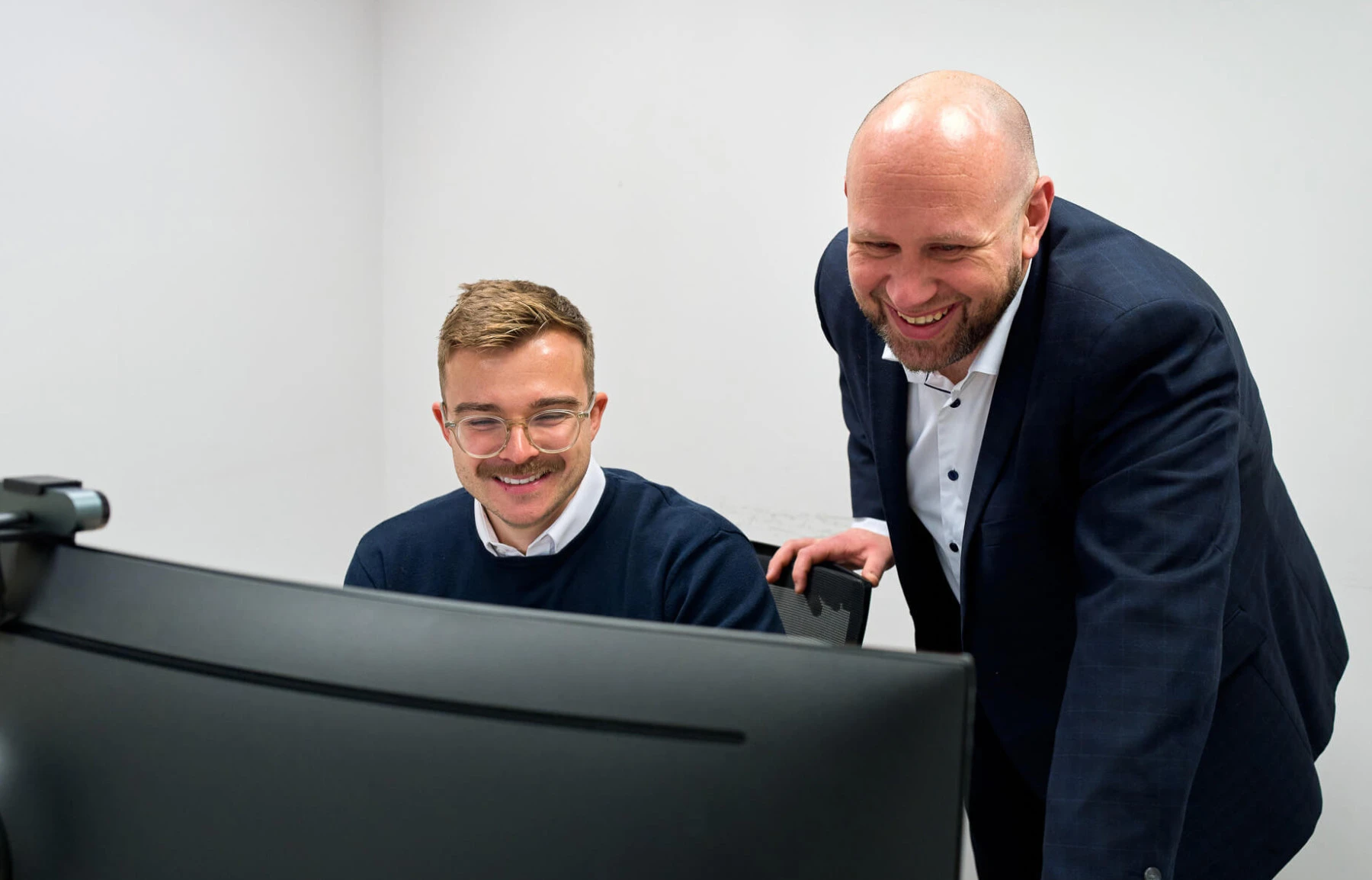 Olly and Karl discussing AI Workshops at Techcare