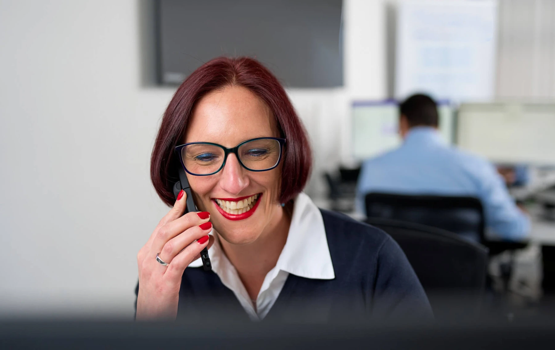 Kelly on VoIP phone call at Techcare