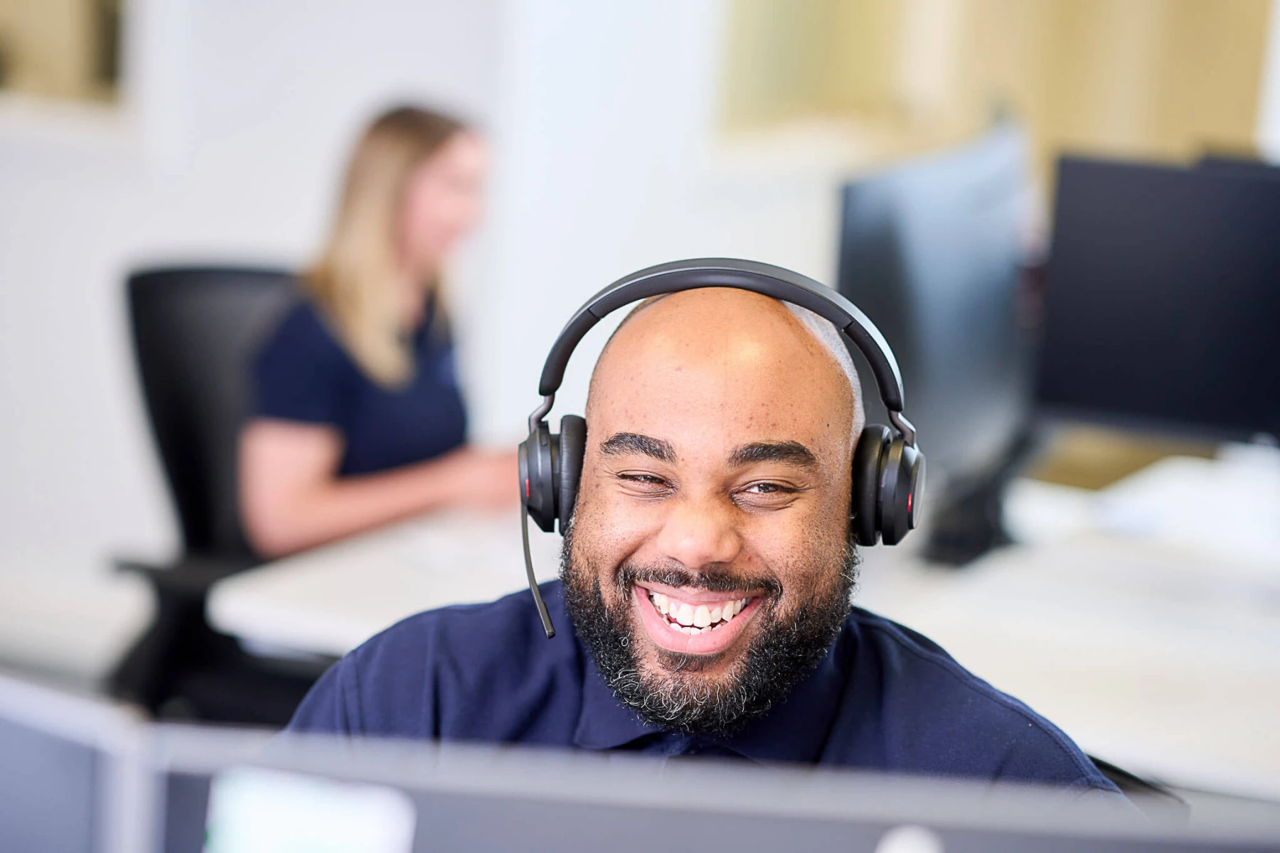 Dan using VoIP on his headset at Techcare